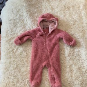 Fuzzy pink teddy onesie